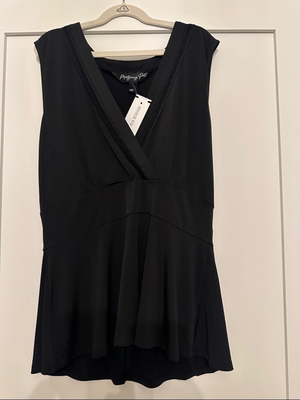Mystique Boutique Sleeveless V-Neck Black Top